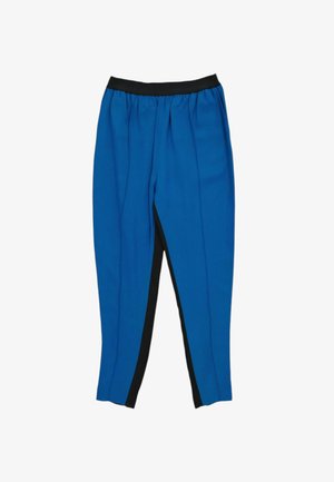Blaue zulaufende Hose mit schwarzem elastischem Bund und schwarzen inneren Seitenstreifen, für die Freizeitkleidung entworfen.