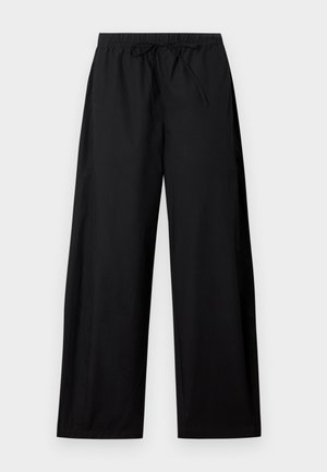 Schwarze weit geschnittene Hose mit elastischem Bund und Kordelzug. Hergestellt aus leichtem Stoff, mit glatter Textur und schlichter Optik.