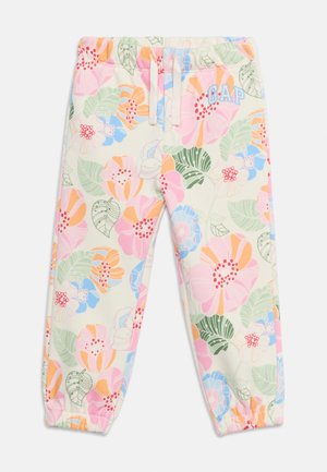 Barnebukser med snøring og elastiske mansjetter, dekorert med store pastellfargede blomster- og grønne løvmønstre og en blå "GAP" logo på hoften.