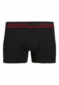 Zwarte boxershorts met een rode elastische tailleband waarop de tekst "JACK & JONES" en "KERST" staat. Gladde stof met een aansluitend ontwerp.
