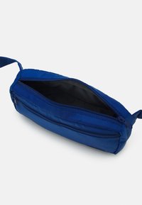 Levi's® MEDIUM BANANA SLING  EMBROIDERED BATWING UNISEX - Bolsa de cintura - navy blue