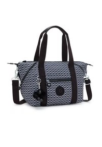 Sort-hvid mønstret duffel bag med dobbelte håndtag, justerbar skulderrem, lynlåslukning og en dekorativ pelsagtig vedhæng.