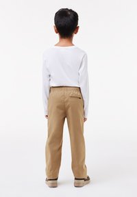 Lacoste Donji dijelovi trenirke - lion