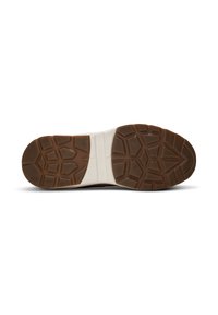 Semelle de chaussure en caoutchouc marron avec un motif de semelle géométrique et une section intermédiaire blanche marquée "X SENSITIVE" sur un fond blanc.