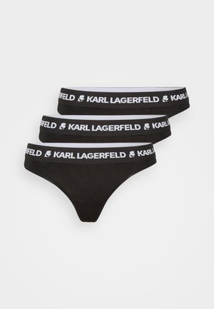 Črn kompletiček tangice z tremi pari, zasnovan iz mehkega blaga in elastičnim pasom, na katerem je bel logo "KARL LAGERFELD".