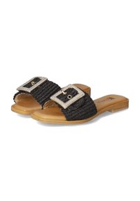 Black woven slides with dual wide straps, featuring a large metallic buckle adorned with rhinestones and a flat, natural wood-colored sole.