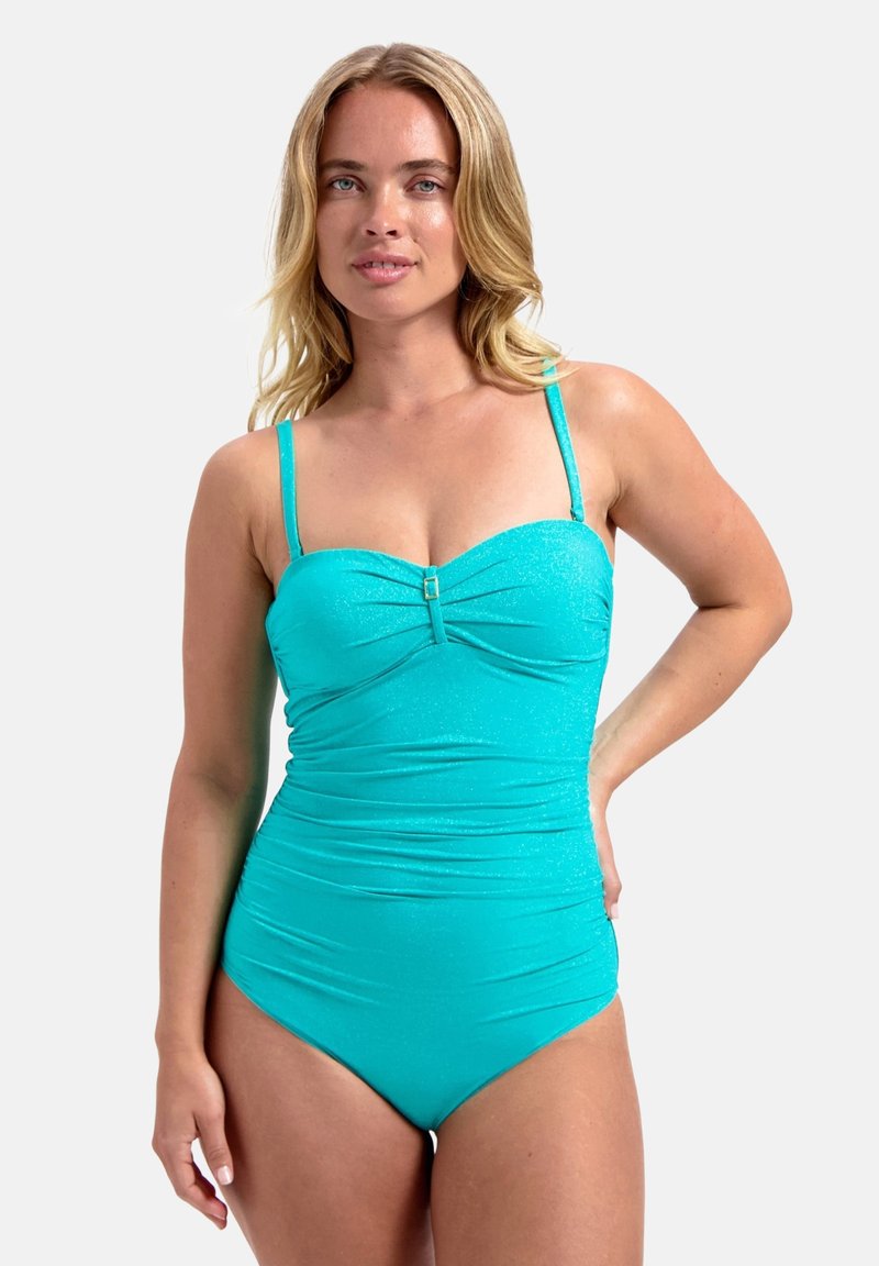 Bañador de una pieza en color turquesa, texturizado, con tirantes ajustables, delantero fruncido con un acento metálico y una silueta entallada.