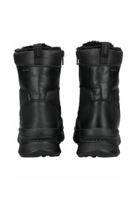 Botas de cuero negras hasta la mitad de la pantorrilla con un forro suave y peludo, superficie lisa, cierre de cremallera trasero y suelas de goma duraderas.