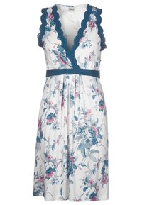 Robe fleurie avec une base blanche, ornée de fleurs bleues et roses. Bordure en teal festonnée, décolleté en V profond et une taille assortie. Tissu doux.
