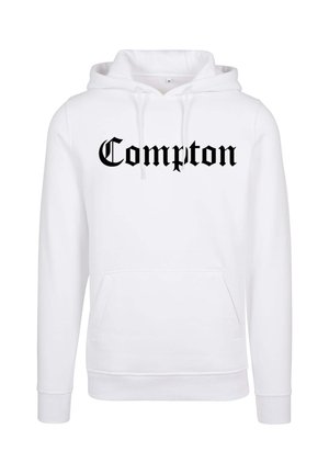 Valge kapuutsiga särk, millel on ees kangaroo tasku ja millel on "Compton" trükitud paksul mustal gooti fondil. Pehme materjal, soonikud mansettides ja vöökohtades.