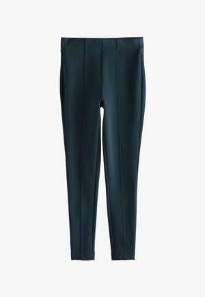 Čierne legíny s vysokým pásom, úzkym strihom, predným švom, dĺžkou po členky a hladkým pružným materiálom.