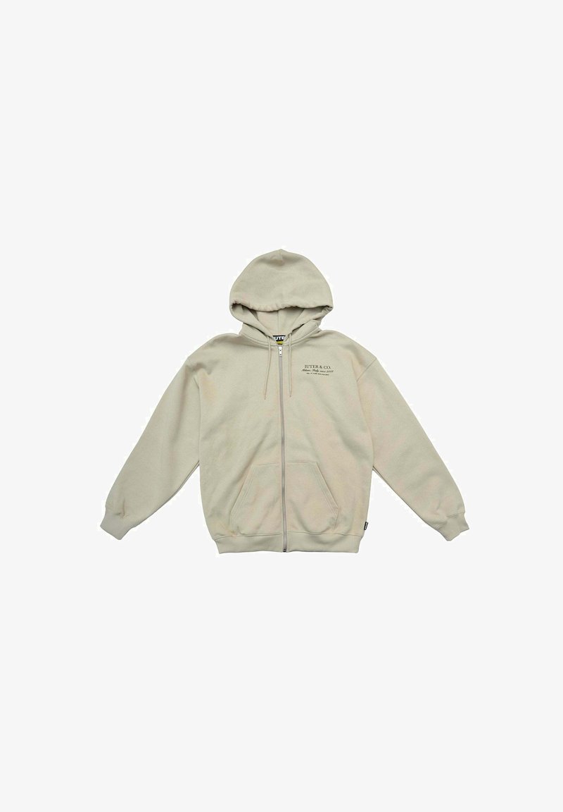 Felpa con zip beige, con cappuccio foderato, tasche frontali e polsini a costine. Presenta il logo del marchio stampato sul lato sinistro del petto. Texture del materiale morbida.