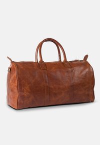 Brown leather duffel bag with dual handles, rounded shape, and visible stitching details. Features a zipper closure and side accents.