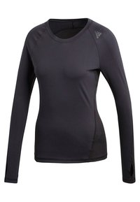 Långärmad gymtröja i svart, tillverkad av ett mjukt, stretchigt material. Har en åtsittande design, meshpaneler på sidorna och tummarhål vid ärmsluten.