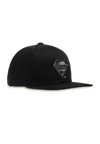 Black snapback cap made of fabric with a flat brim. Features an embossed black Superman logo on the front. Simple design, no patterns or accents.