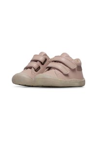 Velcro-strap shoes with a soft pink leather upper, rounded toe, and textured rubber sole. Desert-style tread pattern on the outsole.