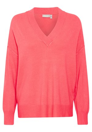 Korálový svetr s véčkovým výstřihem, dlouhými rukávy a žebrovanými okraji. Měkká pletená textura s uvolněným střihem a jemnými švy.