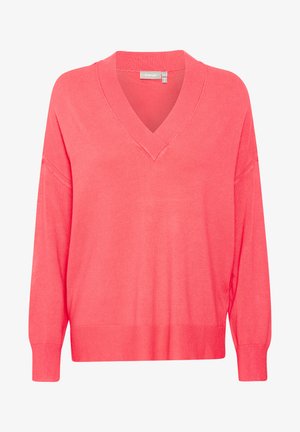 Pull en v en corail, avec des manches longues et des poignets côtelés. Texture douce en tricot avec une coupe décontractée et des détails de couture subtils.