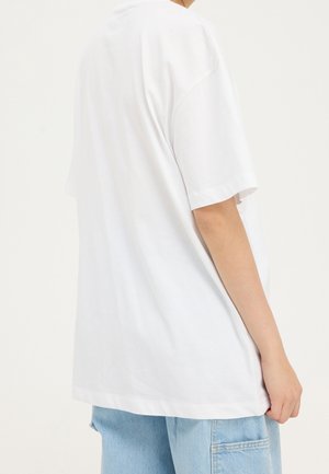 T-shirt con stampa - white