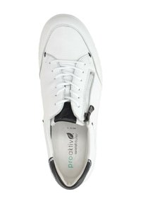White leather sneaker with black accents, textured surface, lace-up front, and side zipper. Insole marked "pro aktiv." Rounded toe design.