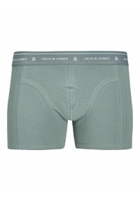 Männer Boxer Shorts aus leichtem grünen Baumwollstoff, mit einem grauen elastischen Bund mit dem Logo "JACK & JONES" und kontrastierenden Nahtdetails.