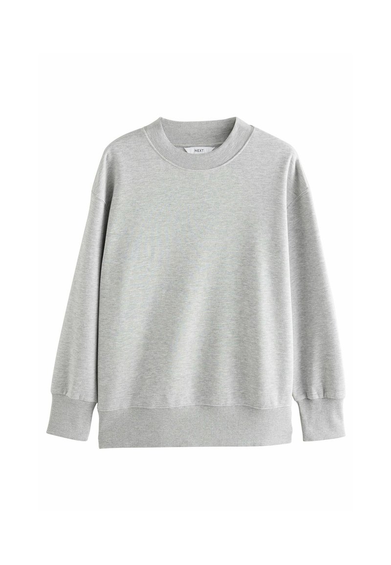 Sweatshirt gris clair en tissu mélangé coton. Il dispose d'un col rond, de longues manches avec des poignets côtelés et d'une coupe décontractée.