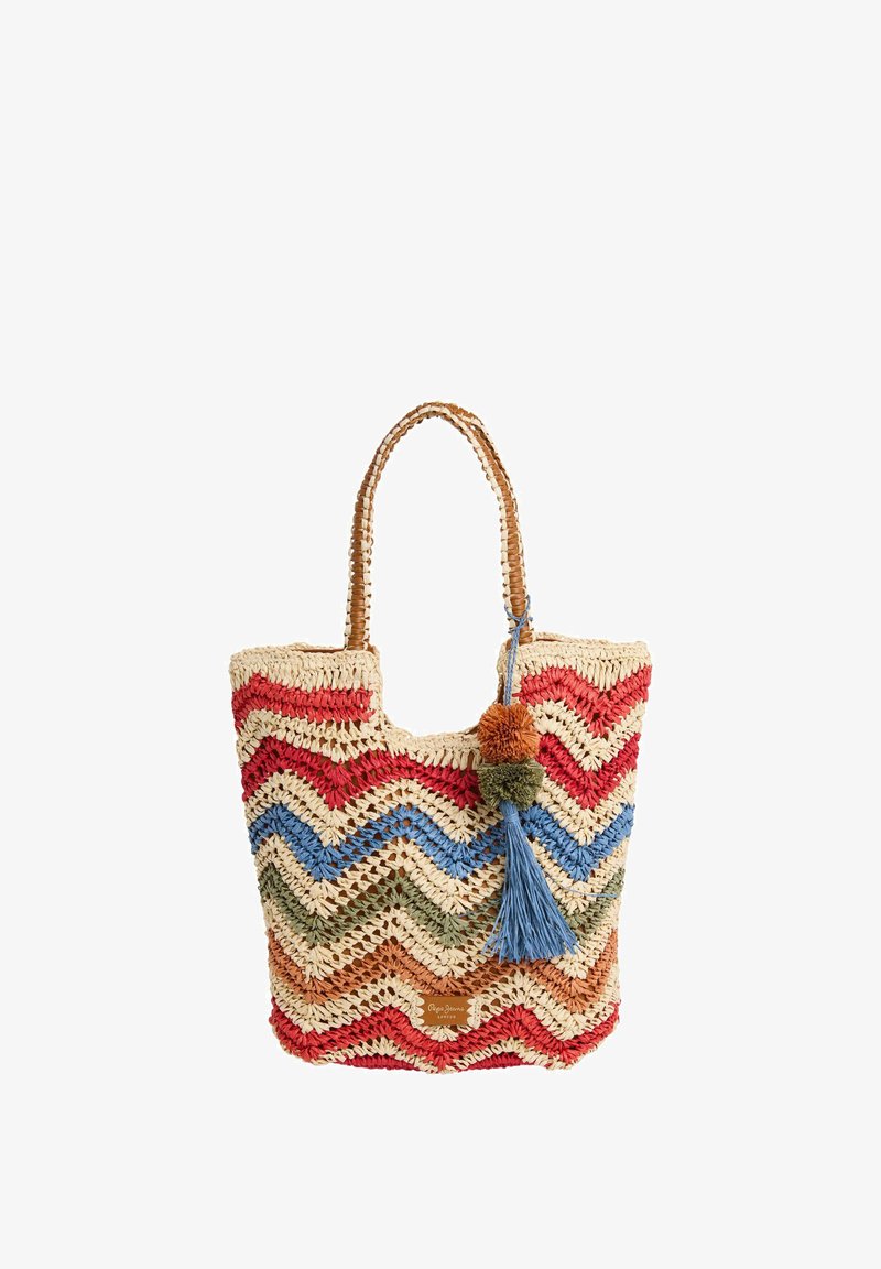 Tkaná slaměná taška s cik-cak vzorem v červenej, modrej, zelenej a oranžovej farbe. Obsahuje ozdoby s strapcami a pom-pommi.