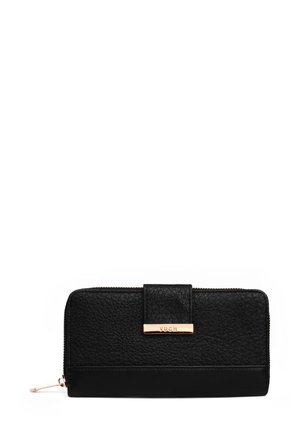 Black textured leather wallet with zipper and snap closure featuring a gold-tone metal brand plate on front.
