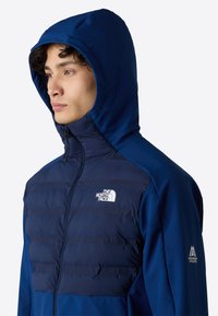 The North Face M MOUNTAIN ATHLETICS CARI HOODED JACKET - Winterjas - estate blue summit navy