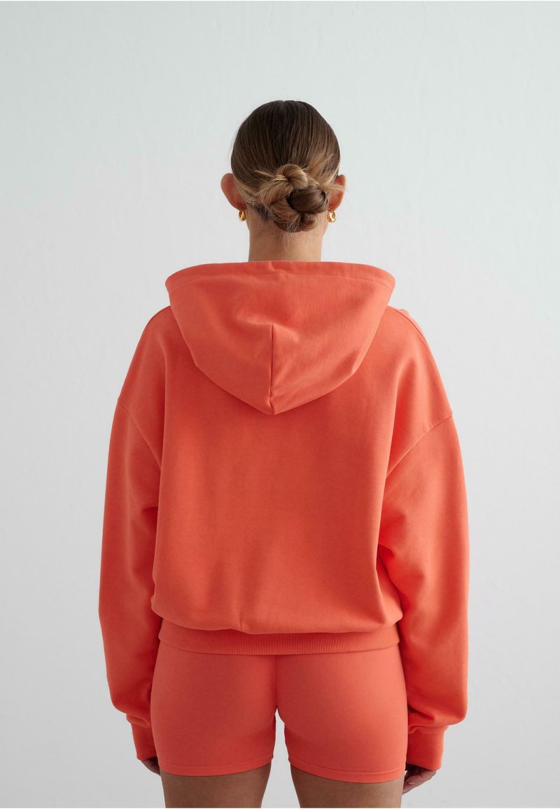 Sweats à capuche pour femme - orange