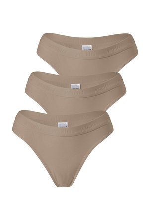Tre mutandine beige da donna impilate, con ampie fasce elastiche in vita e un discreto marchio "Yenita" con etichette di tessuto bianche al centro.