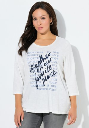 - Bluzka z długim rękawem