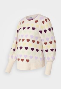 Pull de couleur crème avec des motifs de cœurs texturés multicolores en rose, violet, vert, marron et jaune. Poignets et ourlet côtelés.