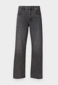 Czarne dżinsy o prostym kroju, wykonane z denimu. Posiadają klasyczny pięcio-kieszeniowy design, zapięcie na guzik oraz subtelną, wyblakłą teksturę. Solidne szwy.