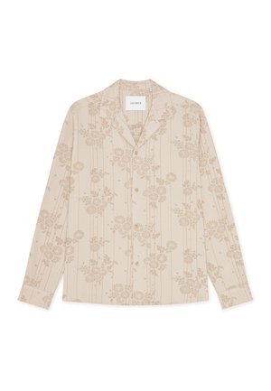 Μπεζ πουκάμισο με κουμπιά, διακοσμημένο με ανθικό μοτίβο και κατακόρυφες γραμμές. Κατασκευασμένο από ελαφρύ ύφασμα, διαθέτει γιακά και μακριά μανίκια.