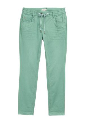 Muntgroene broek van zachte stof, met een trekkoord in de taille, twee voorzakken en subtiele stiksels langs de zijnaad.