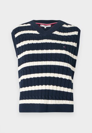 Vestă tricotată fără mâneci în dungi bleumarin și crem, cu decolteu în V și textură ribată. Are un logo mic pe piept.