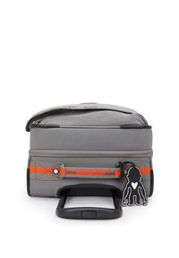 Gray rolling bag with a sturdy black handle, orange accent strap, and a black character tag, featuring a textured finish and top zipper closure.