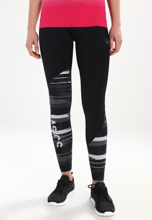 Leggings sportive neri con un motivo geometrico in grigio e bianco. Il design presenta un'area nera uniforme e un logo ASICS sulla gamba.