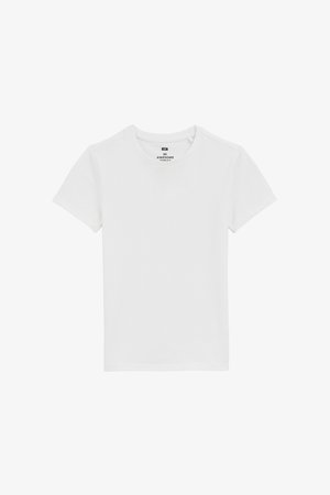 T-shirt bianco in cotone con colletto rotondo, maniche corte e taglio dritto. Presenta un'etichetta stampata all'interno del collo.