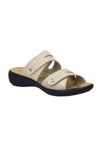 Beige schuifsandalen met twee kruisbanden, verstelbare sluitingen, subtiele stiksels, een gestructureerde binnenzool en een zwarte buitenzool.
