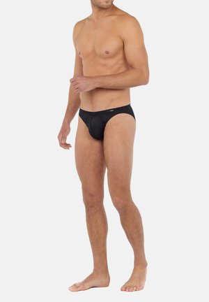 Schwarze Herrenunterhosen aus glattem, elastischem Stoff. Sie verfügen über einen bequemen Bund und ein minimalistisches Design ohne sichtbare Muster.