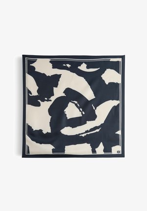 Tessuto astratto bianco e nero con motivi audaci e forme irregolari e un bordo doppio sottile.