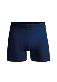 Temno modri bokserji s mehkimi pasovi, ki nosijo ime blagovne znamke "MUCHACHO MALO." Narejeni so iz gladkega, raztegljivega materiala z oprijetim dizajnom.