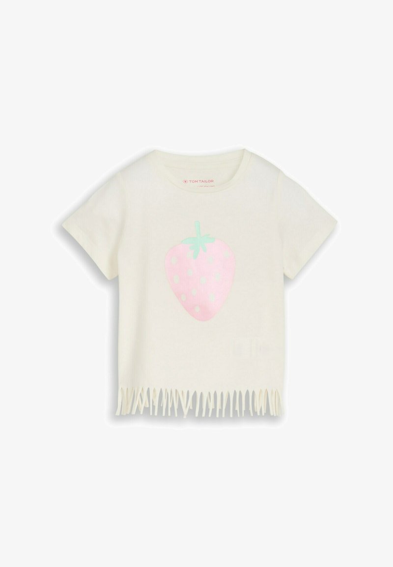 Chemise crème à manches courtes avec ourlet à franges, présentant une grosse fraise rose pastel avec des feuilles vertes sur le devant.