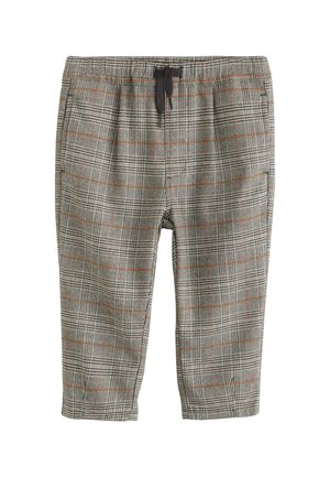 Pantalon à carreaux gris avec des lignes orange, taille élastique et cordon noir, longueur raccourcie.