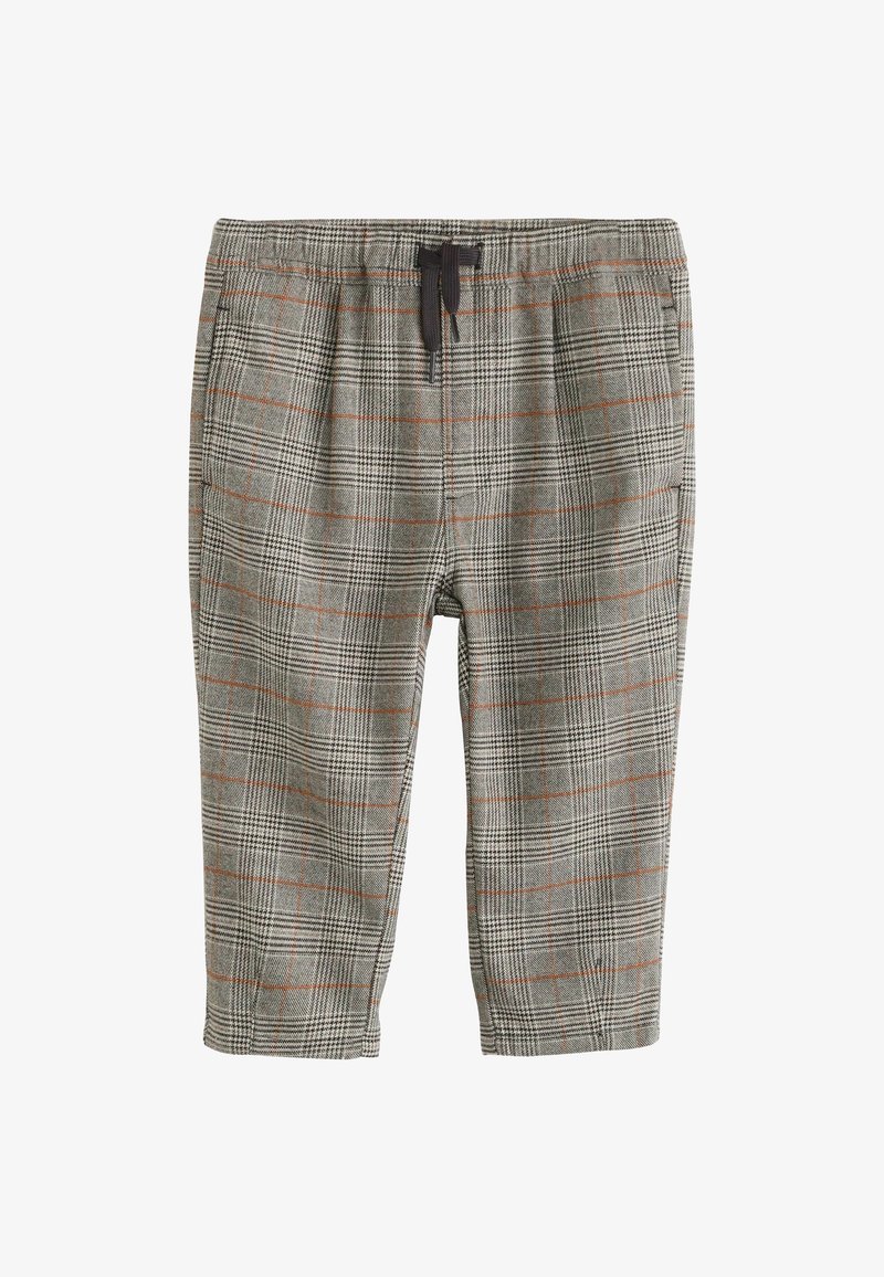 Pantalon à carreaux gris avec des lignes orange, taille élastique et cordon noir, longueur raccourcie.