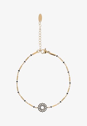 Delikatna bransoletka z łańcuszka ze złota z małymi czarnymi koralikami i centralnym czarnym zawieszonym w kształcie kwiatu, wyposażona w regulowane zapięcie i przedłużkę.
