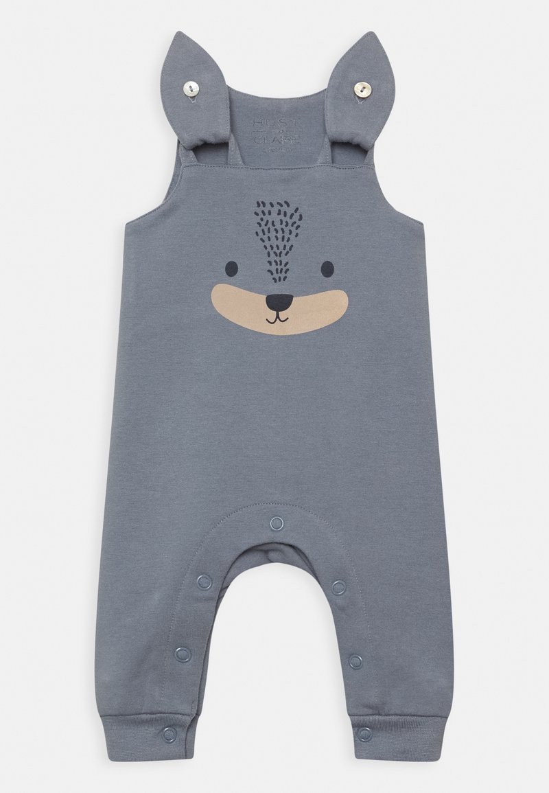 Szare bawełniane ogrodniczki z nadrukiem twarzy misia, z zatrzaskami na dole oraz miękkimi ramiączkami w kształcie uszu dla dodatkowego akcentu.