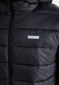 Jack & Jones JJVINCENT PUFFER HOOD - Light jacket - dark grey